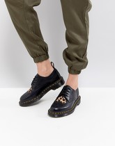 Dr.Martens - Joyce - Chaussures plates à lacets avec cœur motif léopard - Noir